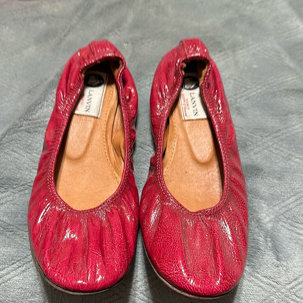 Pink shoes I was told they are an 8 . They have an elastic body up top.